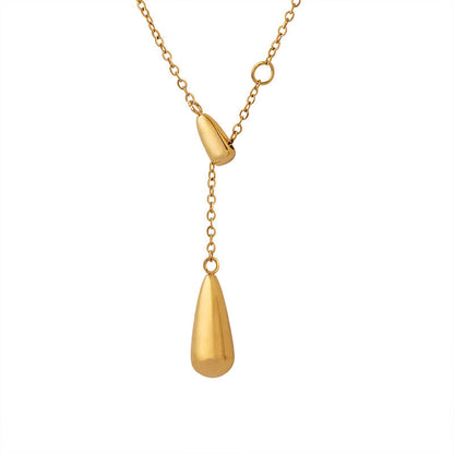 Clean product shot of the titanium steel gold necklace isolated on a white background.