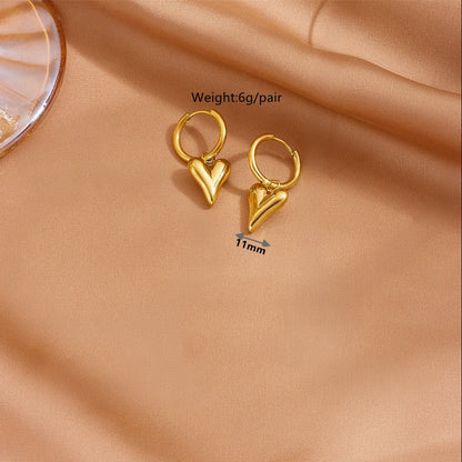 Measurement diagram of the heart earrings showing the 11mm heart width and 6g/pair weight.