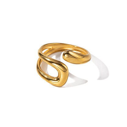 Professional studio shot of a chunky 18K gold plated organic open ring with an irregular "melted" design on a white background.