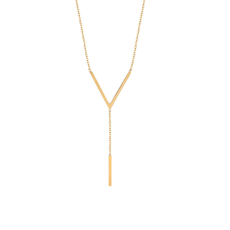 Professional studio shot of the gold-plated 304 stainless steel Y-necklace featuring a geometric V-junction and a long, sleek vertical bar pendant against a white background.